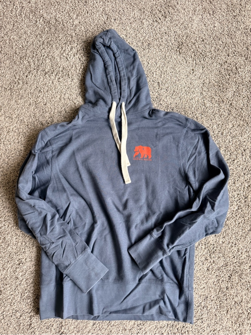 The Normal Brand Slate Blue Hoodie with Orange Bear Logo